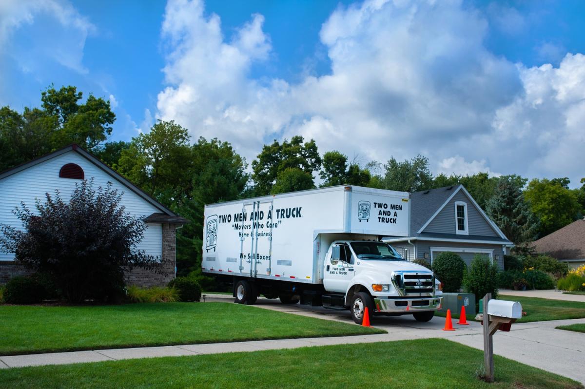 TWO MEN AND A TRUCK moving truck at customer&#039;s house 