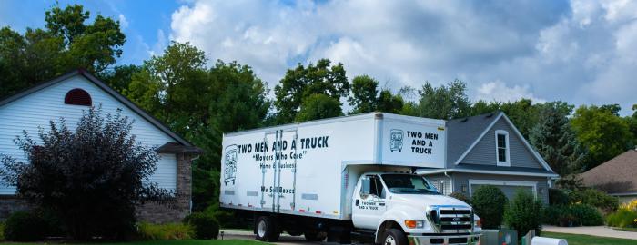 TWO MEN AND A TRUCK moving truck at customer&#039;s house 