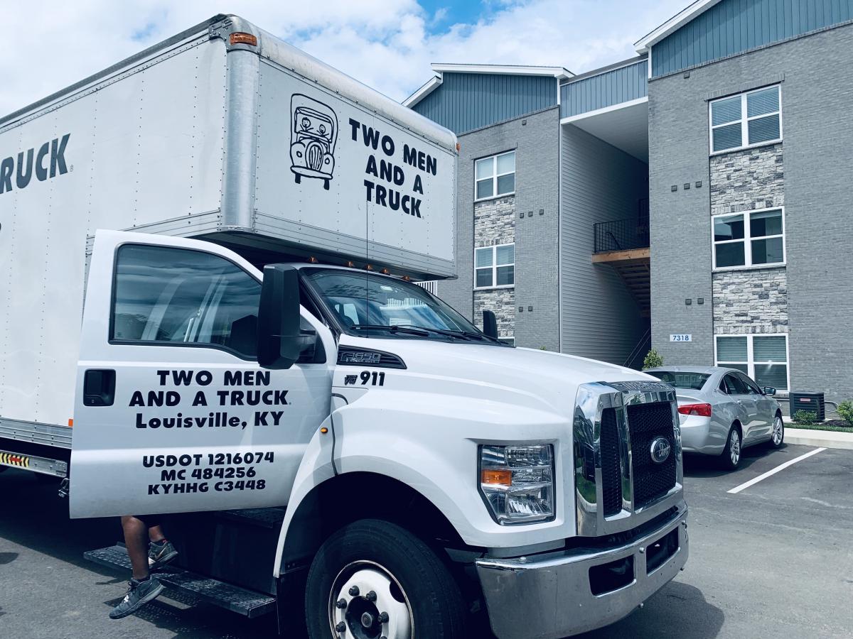 Moving truck in front of an apartment