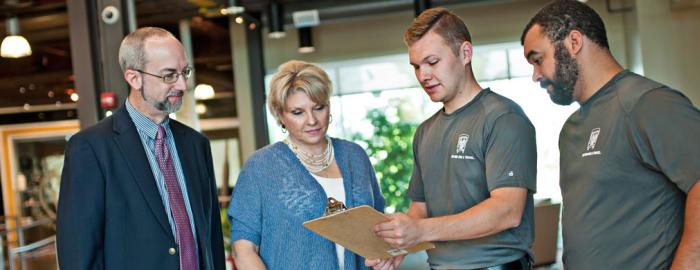 Woman talking with moving team