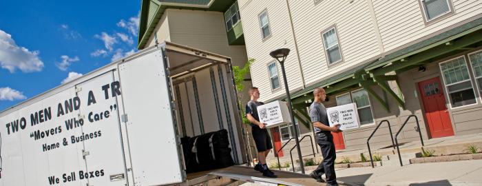 Movers outside an Apartment